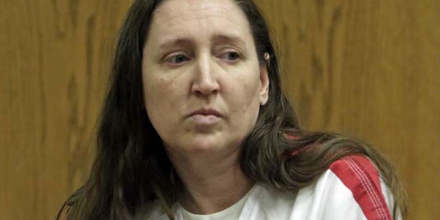 FILE 2014: Megan Huntsman, 39, entered six guilty pleas Thursday morning in a court in Provo.