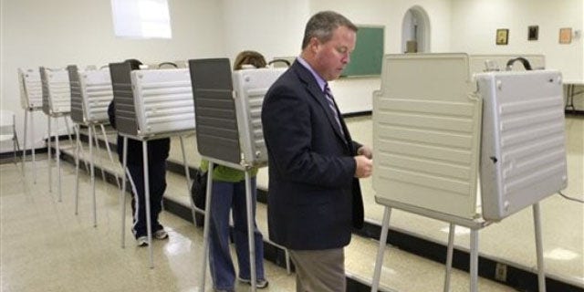 Shown here is ex-Rep. Steve Driehaus as he walks to a booth to vote in Covedale, Ohio, on Nov. 2, 2010. Driehaus lost the election.