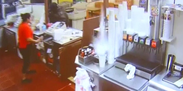 The robber was arrested, but the shooting suspect drove away after the incident.
