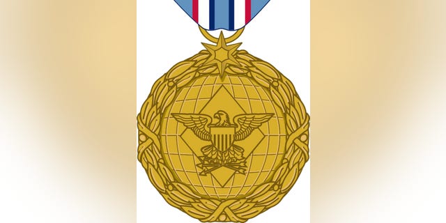 FILE: Undated: This image released by the Department of Defense shows the obverse view with ribbon of the newly announced Distinguished Warefare Medal.