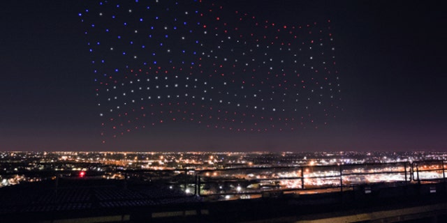An Intel Shooting Star drones fleet lights up the sky in an American Flag formation during the Pepsi Zero Sugar Super Bowl LI Halftime Show on Sunday, Feb. 5, 2017. (Credit: Intel Corporation)