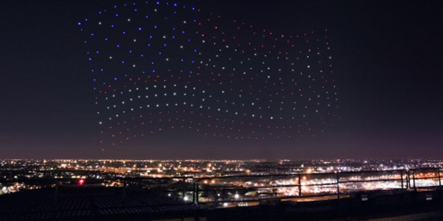 An Intel Shooting Star drones fleet lights up the sky in an American Flag formation during the Pepsi Zero Sugar Super Bowl LI Halftime Show on Sunday, Feb. 5, 2017. (Credit: Intel Corporation)
