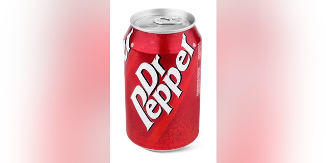 Closeup of aluminum red can of Dr Pepper isolated on white background with clipping path. Dr. Pepper is now manufactured by the Dr Pepper Snapple Group, Inc.