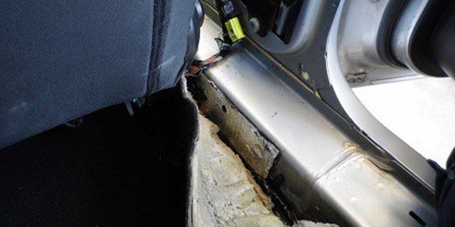 The 92 pounds of heroin allegedly found in the vehicle is valued at more than $870,000.