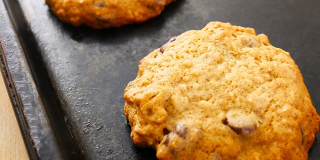 A worker at a cookie store in Texas was temporarily suspended for purchasing an order for a police officer.