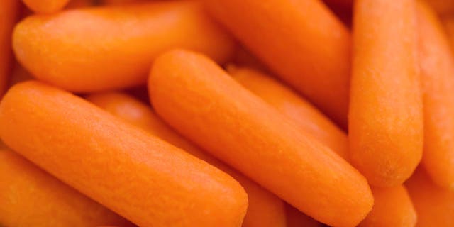 Close-up of baby carrots with selective focus.