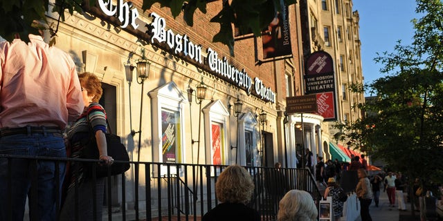 BOSTON - JUNE 14: People entering on Boston University Theatre for the Huntington Theatre Company production of "Private Lives." (Photo by Essdras M Suarez/The Boston Globe via Getty Images)