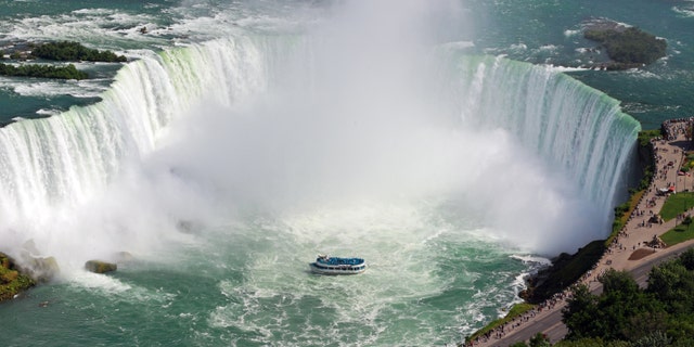 Aerial view of Horseshoe Falls, Maid of the Mist Boat and Niagara River