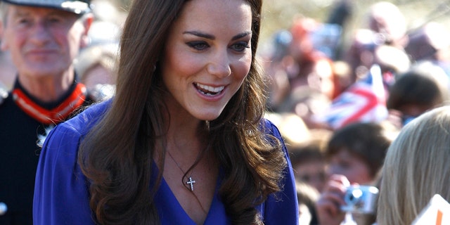 March 19, 2012: Britain's Duchess of Cambridge meets members of the public as she arrives at The Treehouse in Ipswich, England.