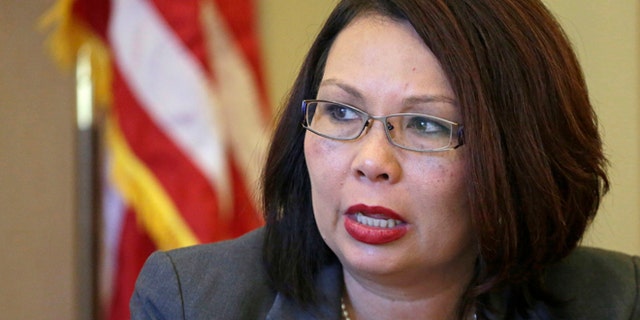 July 31, 2015 file photo: U.S. Rep. Tammy Duckworth D-Ill., appears before the Chicago City Council's finance committee.