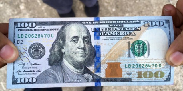 Stranger gave this $100 to a woman who couldn't afford a tow truck after her car broke down. (Dunwoody Police Department)