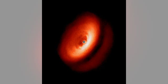 An image from the Very Large Telescope's SPHERE instrument showing the dusty disk around the young star IM Lupi.