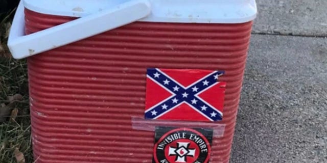 A worker lost his job after his cooler with “offensive” Ku Klux Klan and Confederate flag stickers was spotted, city officials said.