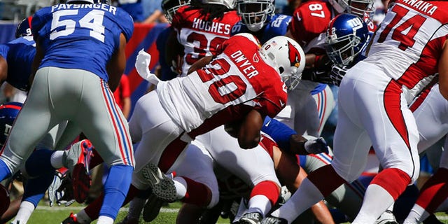 Sept. 14, 2014: Arizona Cardinals running back Jonathan Dwyer (20) rushes for a touchdown during the first half of an NFL football game against the New York Giants in East Rutherford, N.J.