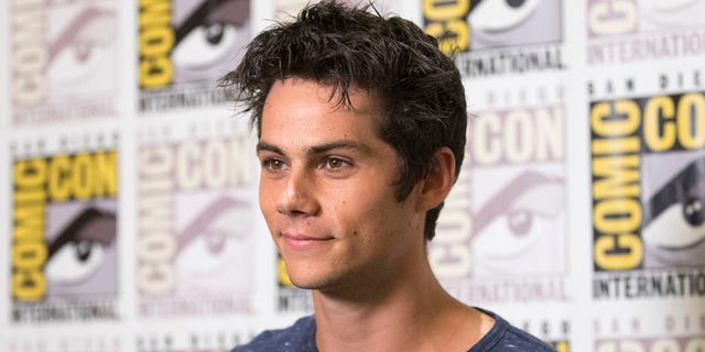 Cast member Dylan O'Brien poses at a press line for "The Maze Runner" during the 2014 Comic-Con International Convention in San Diego, California July 25, 2014.  REUTERS/Mario Anzuoni (UNITED STATES - Tags: ENTERTAINMENT) - RTR406BA