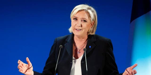 Far-right leader and candidate for the 2017 French presidential election, Marine Le Pen, addresses supporters after exit poll results of the first round of the presidential election were announced at her election day headquarters in Henin-Beaumont, northern France, Sunday, April 23, 2017. Polling agency projections show far-right leader Marine Le Pen and centrist Emmanuel Macron leading in the first-round French presidential election.
