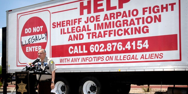 FILE - In this Thursday, July 29, 2010, file photo, Maricopa County Sheriff Joe Arpaio gives a news conference in Phoenix, announcing his crime suppression sweeps. The immigrant smuggling squad that was once a source of political strength for Arpaio is now a legal liability. Hearings will begin Tuesday, April 21, 2015, to determine if Arpaio should be held in contempt for defying a judgeâs order to stop his immigration patrols. (AP Photo/Matt York, File)