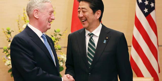 Defense Secretary Jim Mattis, left, with Japanese Prime Minister Shinzo Abe on Friday.