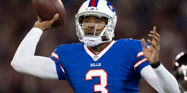 Buffalo Bills quarterback EJ Manuel launches a pass against the Atlanta Falcons during first half NFL football action in Toronto on Sunday Dec. 1, 2013. (AP Photo/The Canadian Press, Frank Gunn)