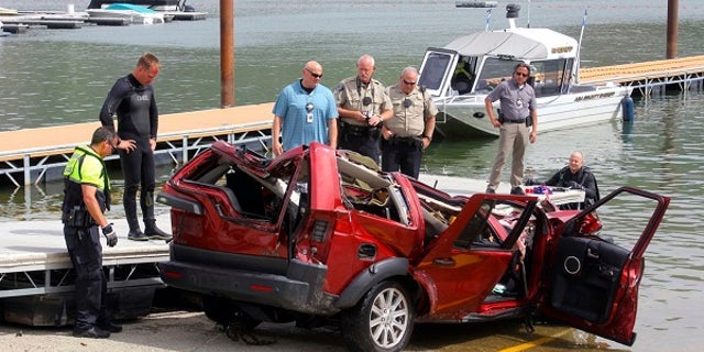 Police said a woman deliberately drove her car off a cliff last year, killing herself and her three children.