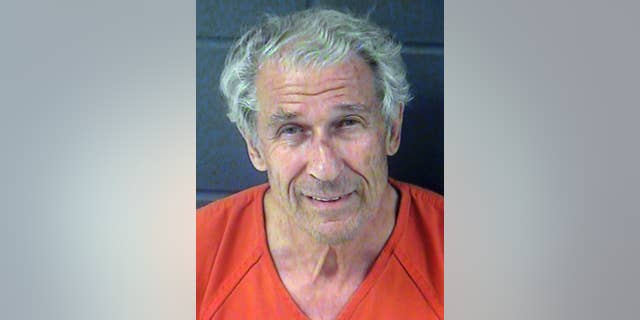 This June 2013 booking photo provided by the Junction City, Kan., Police Department shows Marshall Dion of Tucson, Ariz. (AP Photo/Junction City Police Department)