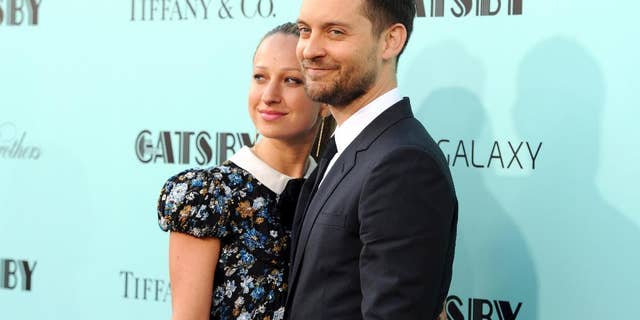 FILE - In this May 1, 2013, file photo, actor Tobey Maguire, right, and wife Jennifer Meyer attend "The Great Gatsby" world premiere in New York. A representative for Maguire confirmed a People magazine report on Oct. 18, 2016, that Maguire and Meyer have separated after nine years of marriage. (Photo by Evan Agostini/Invision/AP, File)