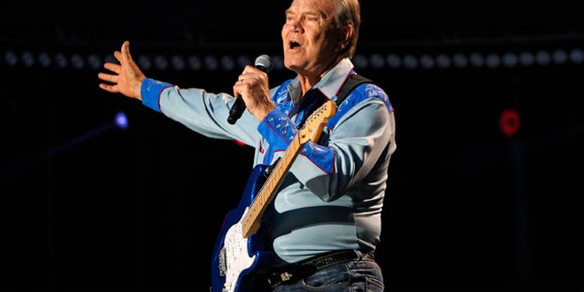 American country music artist Glen Campbell performs during the Country Music Association Music Festival in Nashville, Tenn. circa 2012.