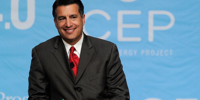 LAS VEGAS, NV - AUGUST 30: Nevada Gov. Brian Sandoval smiles during the National Clean Energy Summit 4.0 at the Aria Resort & Casino at CityCenter August 30, 2011 in Las Vegas, Nevada. Political and economic leaders are attending the summit to discuss a domestic policy agenda to advance alternative energy for the country's future. (Photo by Ethan Miller/Getty Images)