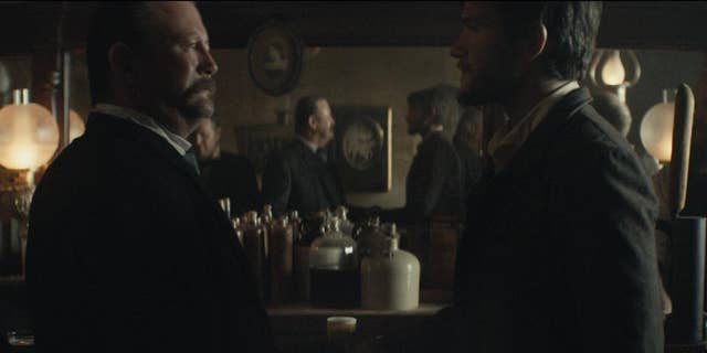 This photo provided by Budweiser shows a scene from the company's spot for Super Bowl 51, between the New England Patriots and Atlanta Falcons, Sunday, Feb. 5, 2017. The scene depicts when Anheuser-Busch co-founder Adolphus Busch, right, after traveling by boat from Germany, met fellow immigrant Eberhard Anheuser. (Budweiser via AP)