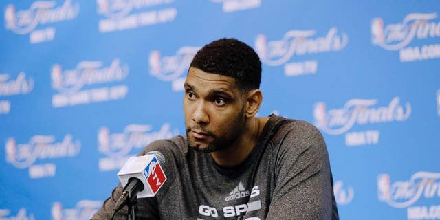 San Antonio Spurs forward Tim Duncan listens to a question during a news conference on Saturday, June 7, 2014, in San Antonio. The team plays Game 2 of the NBA Finals against the Miami Heat on Sunday. (AP Photo/Eric Gay)