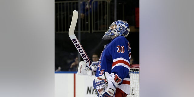 New York Rangers goalie Henrik Lundqvist (30), of Sweden, reacts after Pittsburgh Penguins defenseman Simon Despres (47) scored a goal in the third period of their NHL hockey game in New York, Thursday, Jan. 31, 2013. The Penguins shutout the Rangers 3-0. (AP Photo/Kathy Willens