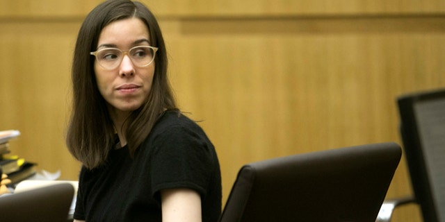 FILE - Jodi Arias looks back at the gallery during the sentencing phase of her trial at Maricopa County Superior Court in Phoenix on Wednesday, Dec. 17, 2014.