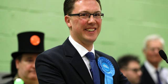 Conservative candidate Robert Courts makes a speech after winning the Witney by-election in Witney, England, Friday, Oct. 21, 2016. Britain's Conservative Party has retained the seat in Parliament vacated by former Prime Minister David Cameron, but with a sharply reduced majority. Conservative candidate Robert Courts won the rural English seat of Witney, taking 45 percent of votes cast _ down from the 60 percent Cameron achieved in the 2015 national election. The centrist Liberal Democrats surged past Labour into second place. Green candidate Larry Sanders _ brother of former Democrat presidential hopeful Bernie Sanders _ came fourth with 3.5 percent of the vote. (Chris Radburn/PA via AP)