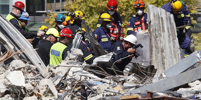 Feb. 24: Emergency services work to remove a body from the site of the CTV building in Christchurch, New Zealand.
