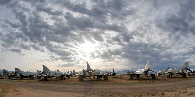 FILE - In this May 21, 2015 file photo a field of F-4 Phantoms are stored at the 309th Aerospace Maintenance and Regeneration Group boneyard in Tucson, Ariz. The last of thousands of F-4 Phantom jets that have been a workhorse for the U.S. military over five decades are being put to pasture to serve as ground targets for strikes by newer aircraft. (AP Photo/Matt York,File)