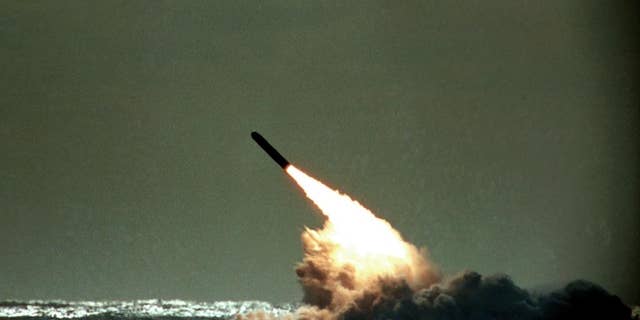 FILE - In this file photo dated Monday, Dec. 4, 1989, a Trident II missile launched by the U.S. Navy during a performance evaluation from the submerged submarine USS Tennessee in the Atlantic Ocean off the coast of Cape Canaveral in Titusville, Fla., USA.
