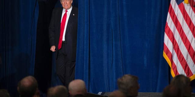 April 27, 2016: Republican presidential candidate Donald Trump arrives to give a foreign policy speech at the Mayflower Hotel in Washington.
