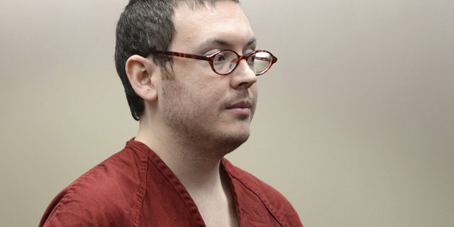 Colorado movie massacre gunman James Holmes listens at a court hearing before beginning his life sentence with no chance of parole, in Centennial, Colorado August 26, 2015.