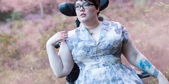 Sally Leadbetter posed for this photo wearing a ModCloth dress, which the brand shared on their Instagram