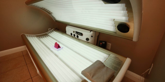 This Dec. 9, 2011 file photo shows an open tanning booth at Amazing Tans in Sacramento, Calif.