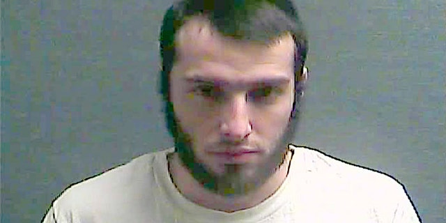 FILE – This July 29, 2016, file booking photo made available by the Boone County Jail in Burlington, Ky., shows Christopher Lee Cornell of Green Township in suburban Cincinnati. Federal authorities say Cornell, who plotted to attack the U.S. Capitol during President Barack Obama's 2015 State of the Union address, kept trying from behind bars to incite others to violence in support of the Islamic State. Prosecutors describe Cornell’s “post-arrest conduct and misconduct” as unusual in a sentencing memorandum filed ahead of a Dec. 5, 2016, sentencing hearing. They want a judge to sentence him to 30 years in prison after he pleaded guilty earlier in 2016 to three charges. (Boone County Jail via AP, File)