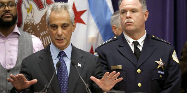 Former Chicago Police Superintendent Garry McCarthy, right, has said he was “thrown under the bus” when he was fired in 2015 by Chicago Mayor Rahm Emanuel.