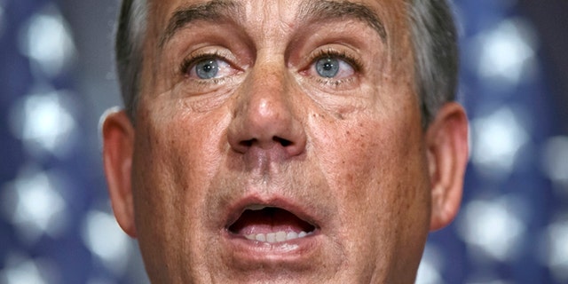 This photo taken July 15, 2014 shows House Speaker John Boehner of Ohio speaking at Republican National Committee headquarters on Capitol Hill in Washington. Constitutional lawyers backing a planned House Republican lawsuit against President Barack Obama told a congressional committee Wednesday that the action is justified because Obama has exceeded his powers in carrying out his health care law. Attorneys allied with Democrats in opposing the election-year suit said it's the GOP that's going too far by trying to resolve a political dispute by handing the question to the federal courts to decide. (AP Photo/J. Scott Applewhite)