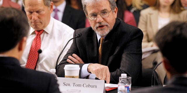 Dec. 1: Sen. Tom Coburn, R-Okla., speaks during a meeting of the commission on Capitol Hill.