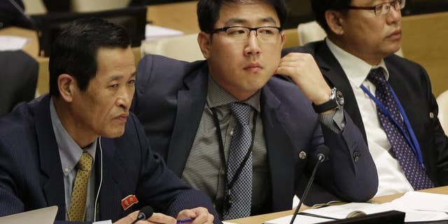 Kim Ju Song, a member of the North Korea delegation, attends a panel discussion on human rights abuses in North Korea at United Nations headquarters, Wednesday, Oct. 22, 2014. (AP Photo/Seth Wenig)