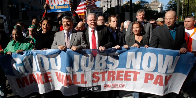 FILE: UNDATED: AFL-CIO President Richard Trumka (3rd L) marches with Jack Ahern, President of the NYC Central Labor Council (3rd R) and other leaders at a rally in New York, N.Y.