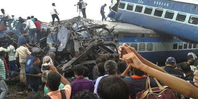 Six coaches of a passenger train derailed in northern India on Saturday, killing more than 20 people and injuring dozens, officials said.