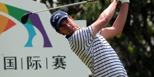 Matteo Manassero of Italy competes during the first round of the Shenzhen International golf tournament at Genzon Golf Club in Shenzhen in southern China's Guangdong Province, Thursday, April 16, 2015. (Chinatopix Via AP) CHINA OUT