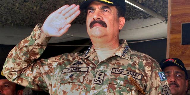 In this Wednesday, Nov. 16, 2016 photo, Pakistan army chief General. Raheel Sharif salutes during a military exercise in Khairpur Tamiwali, Pakistan. Pakistani army says on Monday, Nov. 21, 2016 its chief Sharif has started his farewell visits a week before his due retirement. Pakistani army's spokesman Lt. Gen. Asim Bajwa's Monday announcement has faded away debates about a possible extension in the three year term of the army chief, who is due to retire on Nov 29. (AP Photo/Muhammad Yousuf)