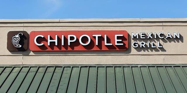 This Monday, Feb. 8, 2016, photo shows the sign over a Chipotle Mexican Grill in Brandon, Fla. The Chipotle marketing executive leading the chain's efforts to rebound after an E. coli outbreak was arrested Tuesday, July 5, 2016, on multiple counts of cocaine possession. (AP Photo/Chris O'Meara)